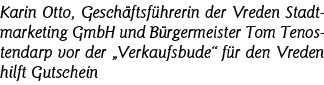 Karin Otto, Geschäftsführerin der Vreden Stadtmarketing GmbH und Bürgermeister Tom Tenostendarp vor der  Verkaufsbude   
